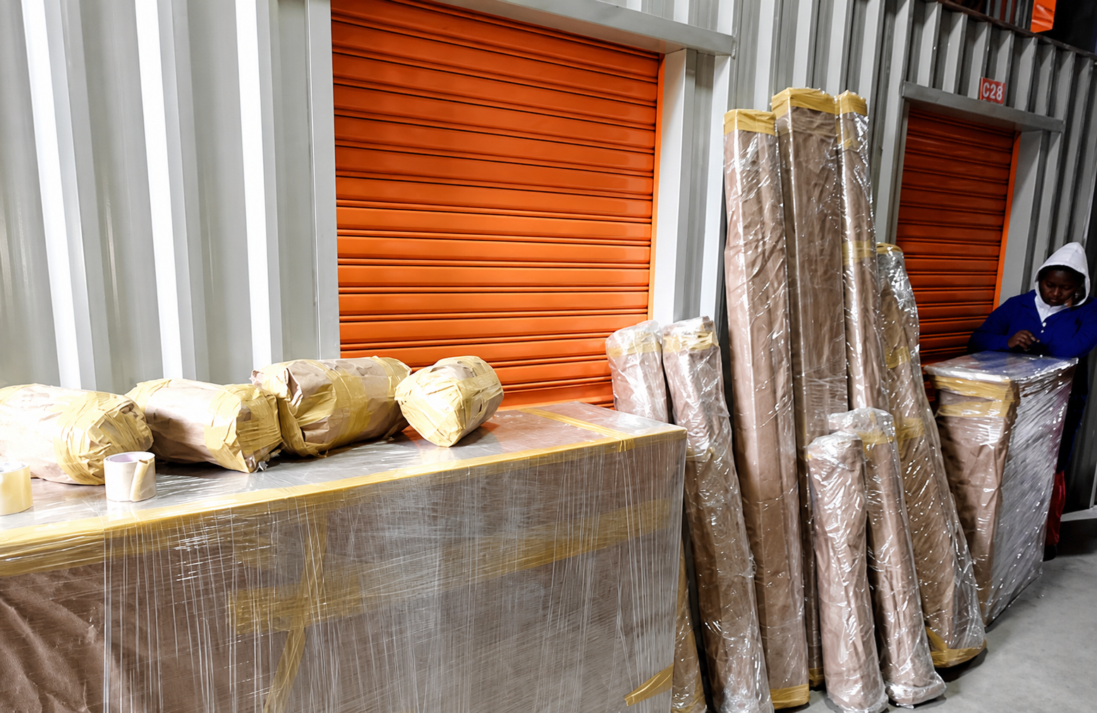 Packed boxes and wrapped household items prepared by Kwikshift Movers